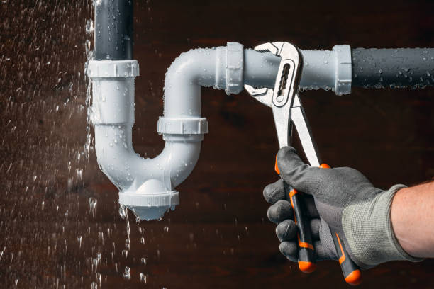 Professional Drain Cleaning technician working in Premium, KY